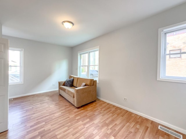 2458 N Clybourn Ave, Chicago, IL 60614 - sitting room with healthy amount of natural light and light wood-style flooring
