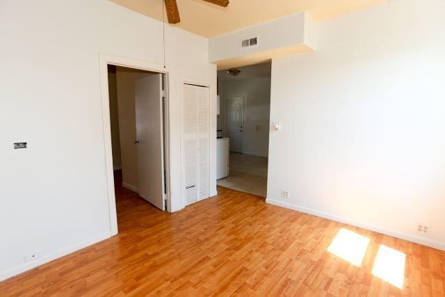 2458 N Clybourn Ave, Chicago, IL 60614 - empty room featuring a ceiling fan and light wood-style floors