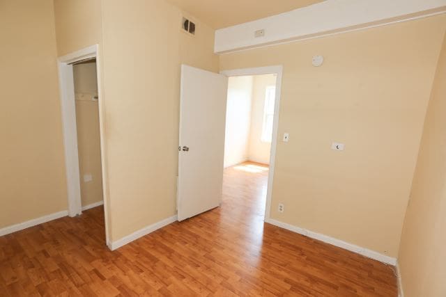 2458 N Clybourn Ave, Chicago, IL 60614 - spare room featuring light wood-style floors and baseboards