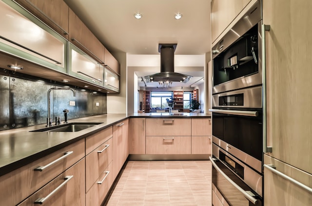2100 N Lincoln Park W Unit 4Dn, Chicago, IL 60614 - kitchen featuring refrigerator, light brown cabinetry, dark countertops, double oven, and recessed lighting