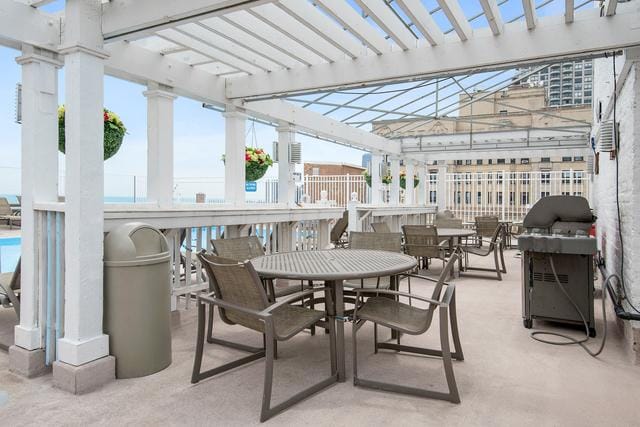 2100 N Lincoln Park W Unit 4Dn, Chicago, IL 60614 - view of patio / terrace with outdoor dining area and a grill