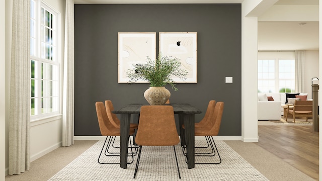 607 Wexford Dr, Elgin, IL 60124 - carpeted dining area with baseboards
