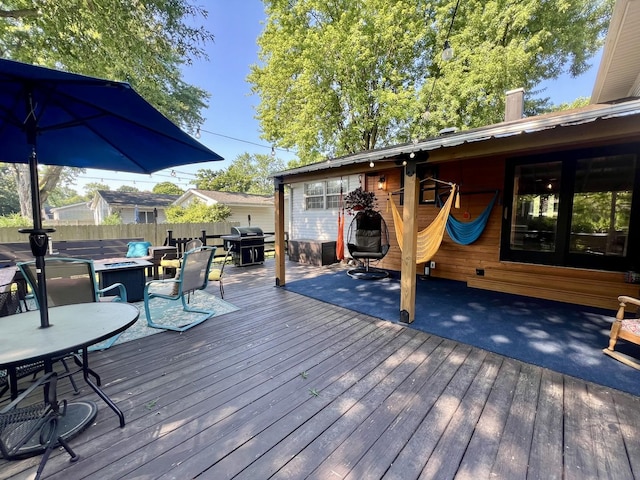 17 Park Dr, Villa Grove, IL 61956 - wooden terrace with an outdoor fire pit, area for grilling, and outdoor dining area