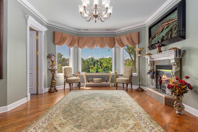 1130 Gavin Ct, Lake Forest, IL 60045 - living area featuring a premium fireplace, a chandelier, ornamental molding, and wood finished floors