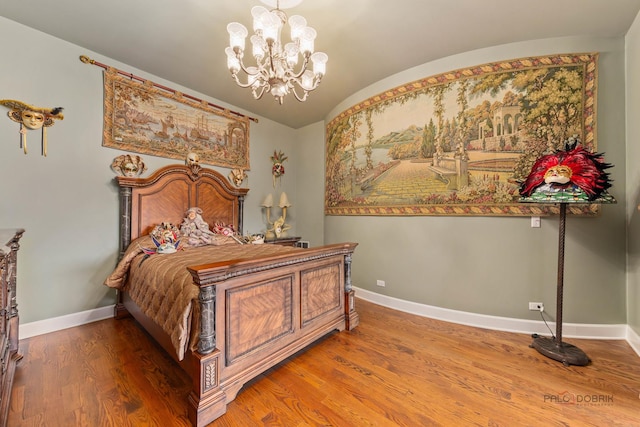 1130 Gavin Ct, Lake Forest, IL 60045 - bedroom featuring a chandelier, wood finished floors, and vaulted ceiling