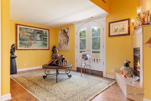 1130 Gavin Ct, Lake Forest, IL 60045 - entryway featuring a warm lit fireplace and wood finished floors
