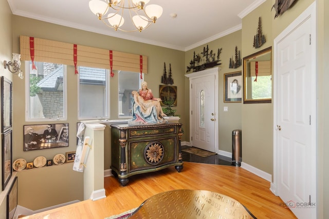 1130 Gavin Ct, Lake Forest, IL 60045 - entryway featuring a chandelier, wood finished floors, and crown molding