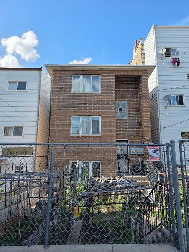 251 W 24th St Unit 1, Chicago, IL 60616 - back of property with brick siding