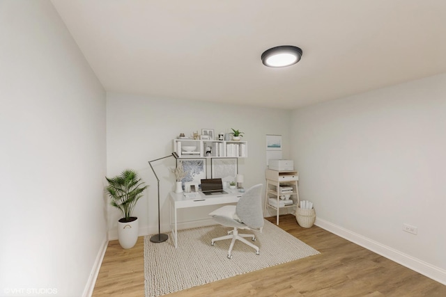 7915 S Justine St, Chicago, IL 60620 - office area featuring light wood-type flooring and baseboards