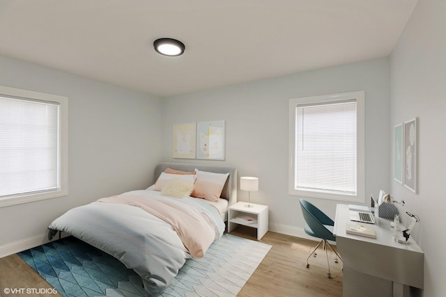 7915 S Justine St, Chicago, IL 60620 - bedroom featuring wood finished floors and an office area