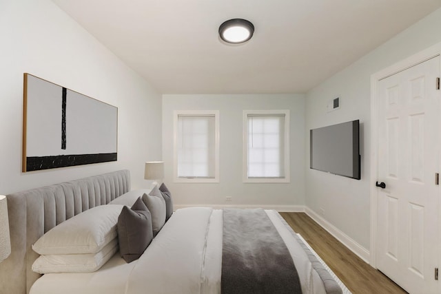 7915 S Justine St, Chicago, IL 60620 - bedroom with wood finished floors and baseboards