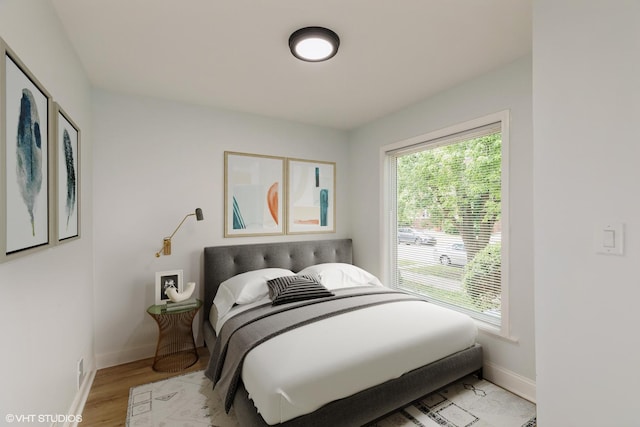 7915 S Justine St, Chicago, IL 60620 - bedroom with baseboards and light wood finished floors