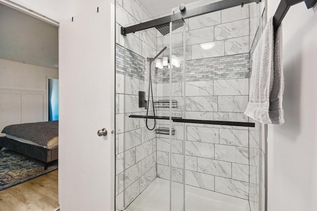 1521 S County Farm Rd Unit 2-2, Wheaton, IL 60189 - ensuite bathroom with a shower stall and wood finished floors
