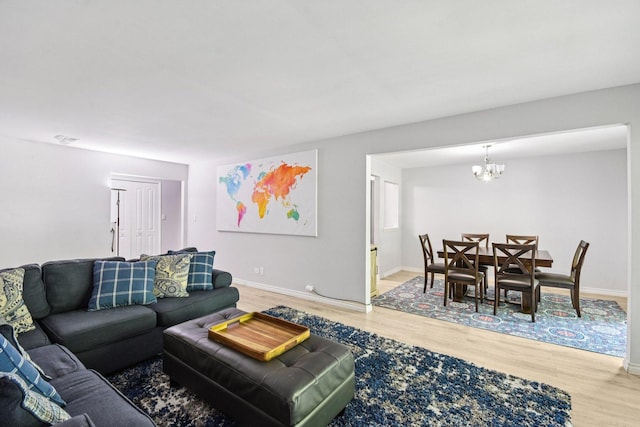 1521 S County Farm Rd Unit 2-2, Wheaton, IL 60189 - living area with wood finished floors and a chandelier
