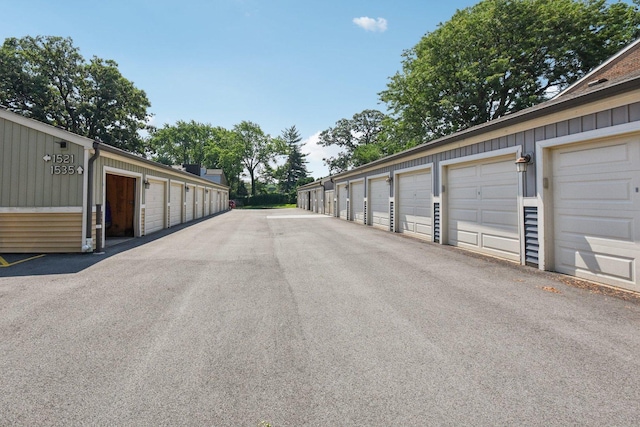 1521 S County Farm Rd Unit 2-2, Wheaton, IL 60189 - view of asphalt road with community garages