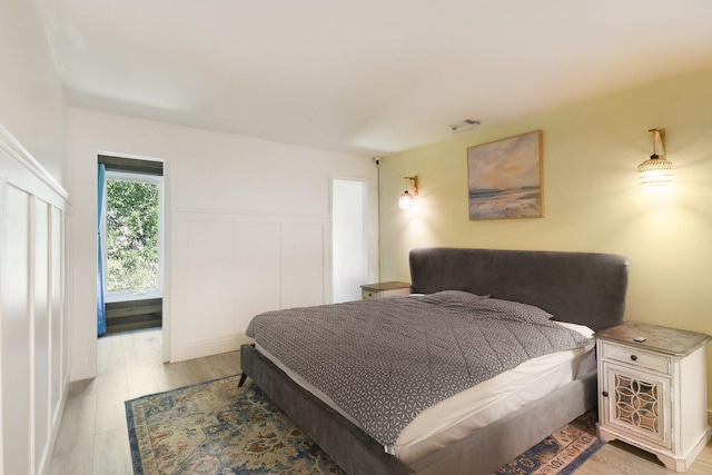 1521 S County Farm Rd Unit 2-2, Wheaton, IL 60189 - bedroom featuring light wood-style flooring