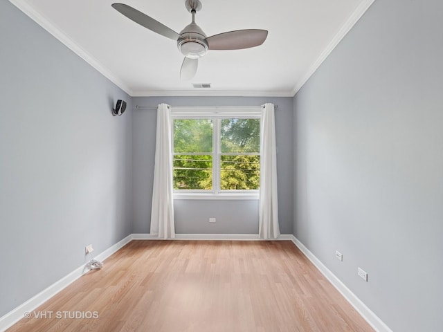 4553 N Magnolia Ave Unit 205, Chicago, IL 60640 - unfurnished room featuring light wood-style floors, ornamental molding, and a ceiling fan