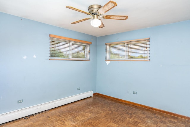 9225 S 84th Ave, Hickory Hills, IL 60457 - unfurnished room with a baseboard heating unit, plenty of natural light, and a ceiling fan