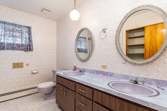 9225 S 84th Ave, Hickory Hills, IL 60457 - full bath with baseboard heating, double vanity, and tile patterned flooring