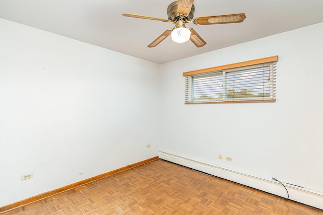 9225 S 84th Ave, Hickory Hills, IL 60457 - empty room featuring a baseboard heating unit and a ceiling fan