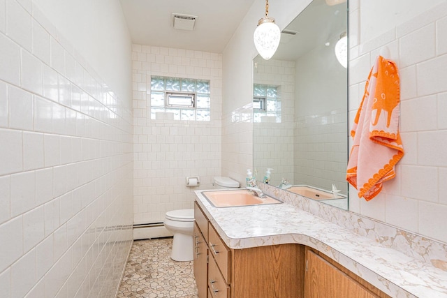 9225 S 84th Ave, Hickory Hills, IL 60457 - bathroom featuring tile walls, vanity, a baseboard radiator, and tile patterned floors