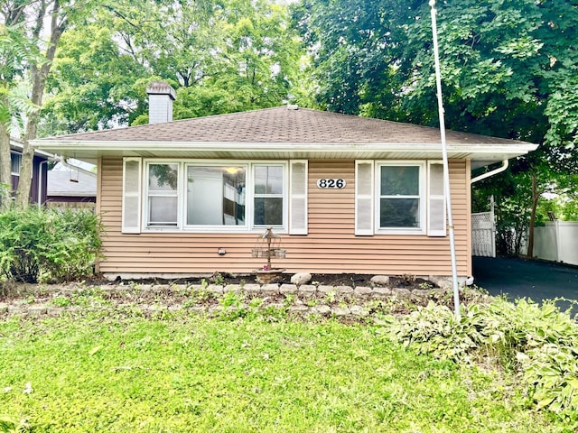 826 S Main St, Lombard, IL 60148 - view of front of house with a chimney