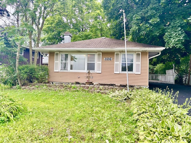 826 S Main St, Lombard, IL 60148 - bungalow with a chimney and a front lawn