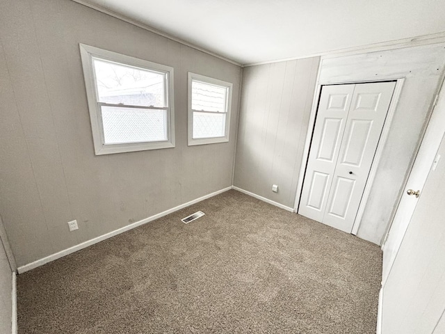 826 S Main St, Lombard, IL 60148 - unfurnished bedroom featuring carpet floors and a closet