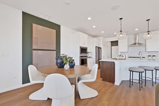 1063 Houston St Unit 89005, Batavia, IL 60510 - dining space with light wood-style flooring and recessed lighting
