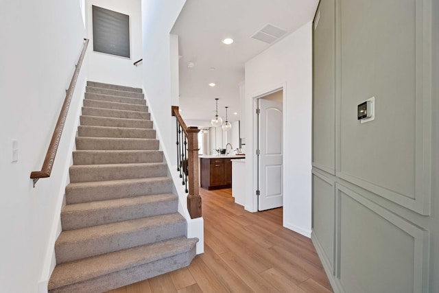 1063 Houston St Unit 89005, Batavia, IL 60510 - staircase featuring wood finished floors and recessed lighting