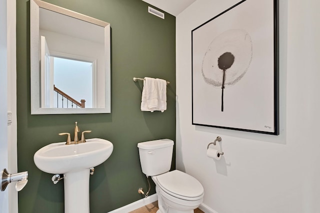 1063 Houston St Unit 89005, Batavia, IL 60510 - bathroom featuring baseboards and toilet