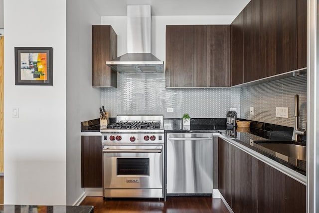 600 N Fairbanks Ct Unit 3304, Chicago, IL 60611 - kitchen featuring stainless steel appliances, wall chimney range hood, dark brown cabinets, and tasteful backsplash
