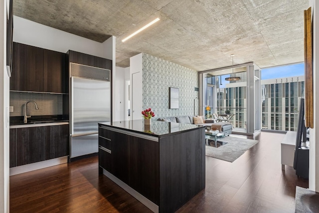 600 N Fairbanks Ct Unit 3304, Chicago, IL 60611 - kitchen featuring stainless steel built in fridge, modern cabinets, dark brown cabinetry, dark wood finished floors, and a kitchen island