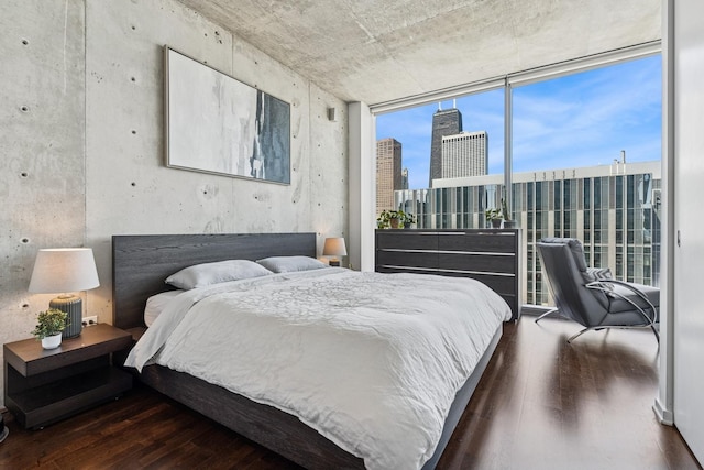 600 N Fairbanks Ct Unit 3304, Chicago, IL 60611 - bedroom with wood finished floors, floor to ceiling windows, and a skyline view
