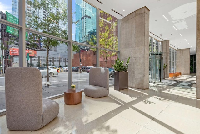 600 N Fairbanks Ct Unit 3304, Chicago, IL 60611 - community lobby featuring expansive windows and a towering ceiling
