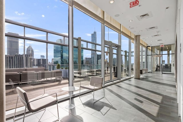 600 N Fairbanks Ct Unit 3304, Chicago, IL 60611 - common area with expansive windows and a skyline view
