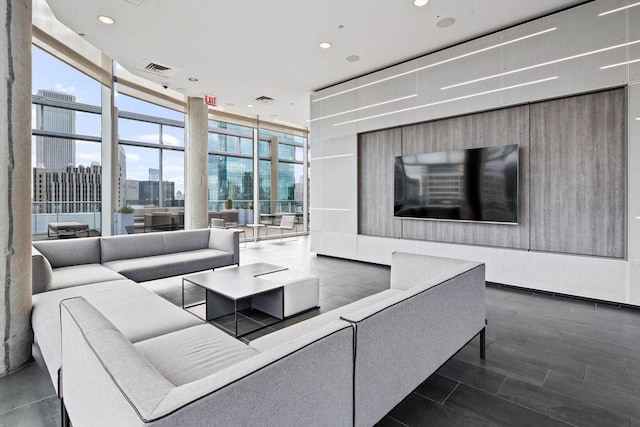 600 N Fairbanks Ct Unit 3304, Chicago, IL 60611 - living room with a wall of windows and recessed lighting