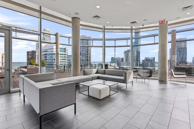 600 N Fairbanks Ct Unit 3304, Chicago, IL 60611 - building lobby featuring a skyline view and expansive windows