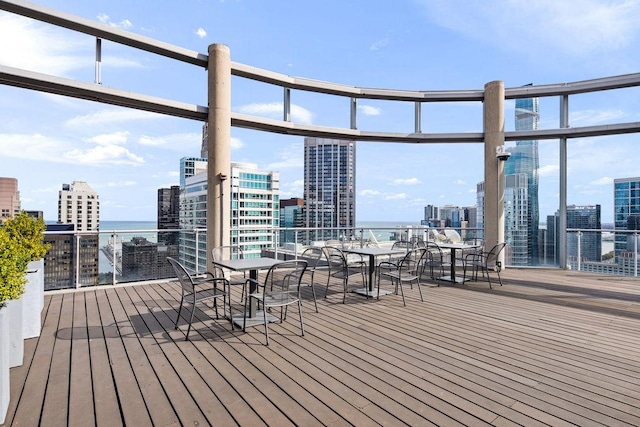 600 N Fairbanks Ct Unit 3304, Chicago, IL 60611 - wooden deck with a view of city, a water view, and outdoor dining space
