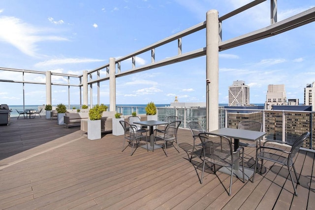 600 N Fairbanks Ct Unit 3304, Chicago, IL 60611 - deck with outdoor dining area, a water view, and an outdoor hangout area