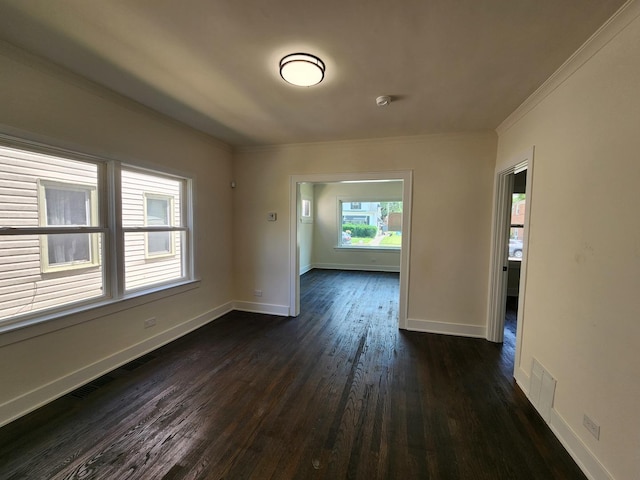 12416 S Carpenter St, Calumet Park, IL 60827 - unfurnished room featuring crown molding and dark wood-type flooring