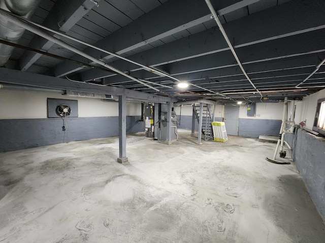 12416 S Carpenter St, Calumet Park, IL 60827 - unfinished basement featuring stairs, water heater, and electric panel
