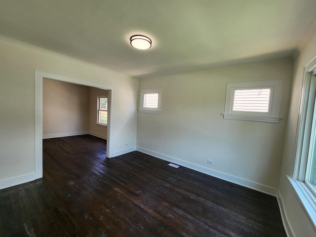 12416 S Carpenter St, Calumet Park, IL 60827 - spare room featuring dark wood finished floors and ornamental molding