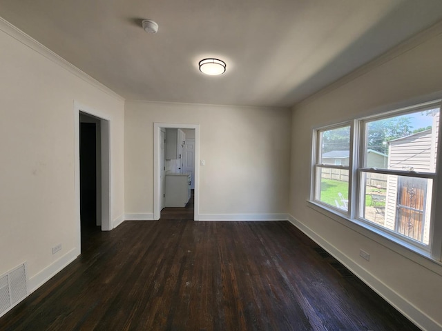 12416 S Carpenter St, Calumet Park, IL 60827 - empty room with dark wood finished floors, crown molding, and a smoke detector