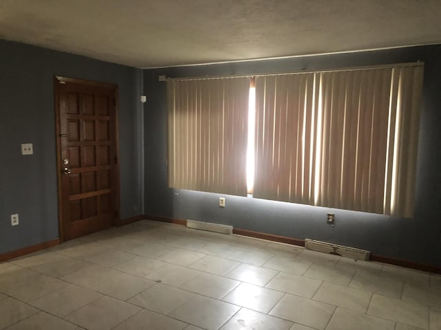 7153 W 72nd St, Nottingham Park, IL 60638 - empty room featuring baseboards