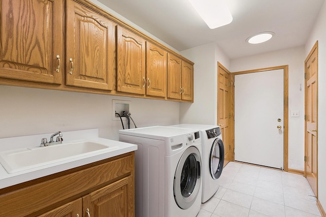 10509 San Luis Ln, Orland Park, IL 60467 - laundry room featuring cabinet space, washer and dryer, and light tile patterned flooring