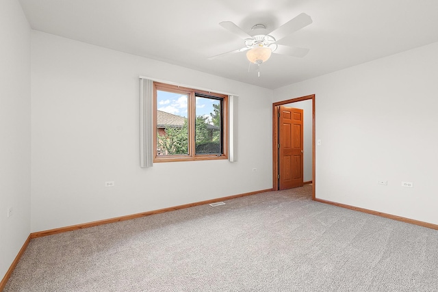 10509 San Luis Ln, Orland Park, IL 60467 - empty room featuring carpet flooring and a ceiling fan