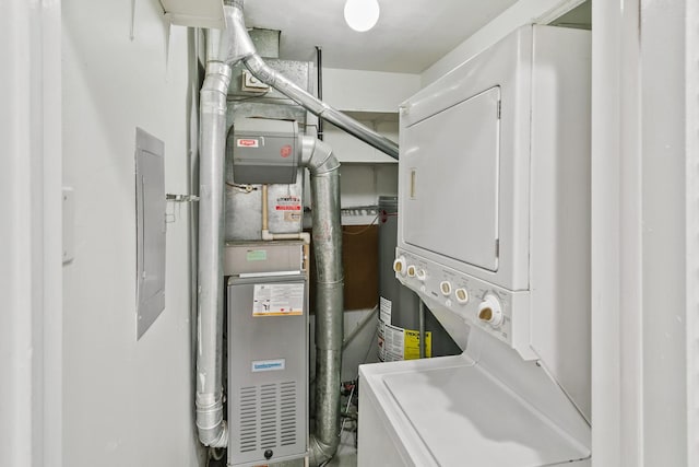 7523 Bristol Ln Unit A, Hanover Park, IL 60133 - washroom with stacked washer / dryer and water heater