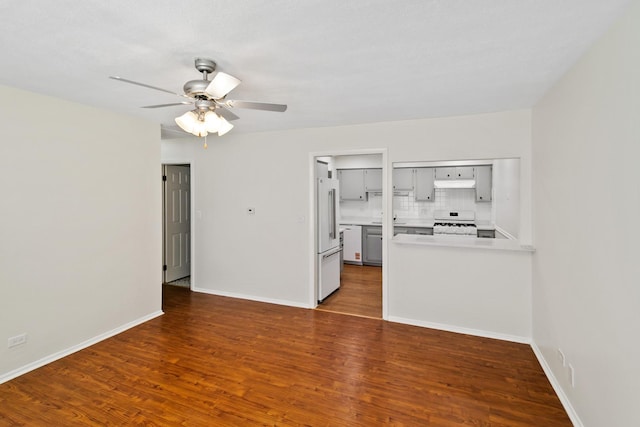 7523 Bristol Ln Unit A, Hanover Park, IL 60133 - unfurnished living room with a ceiling fan and wood finished floors