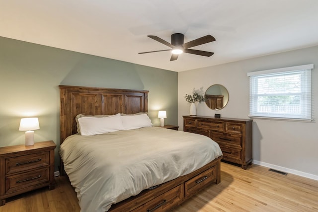 639 N Stephen Dr, Palatine, IL 60067 - bedroom with light wood-style flooring and ceiling fan